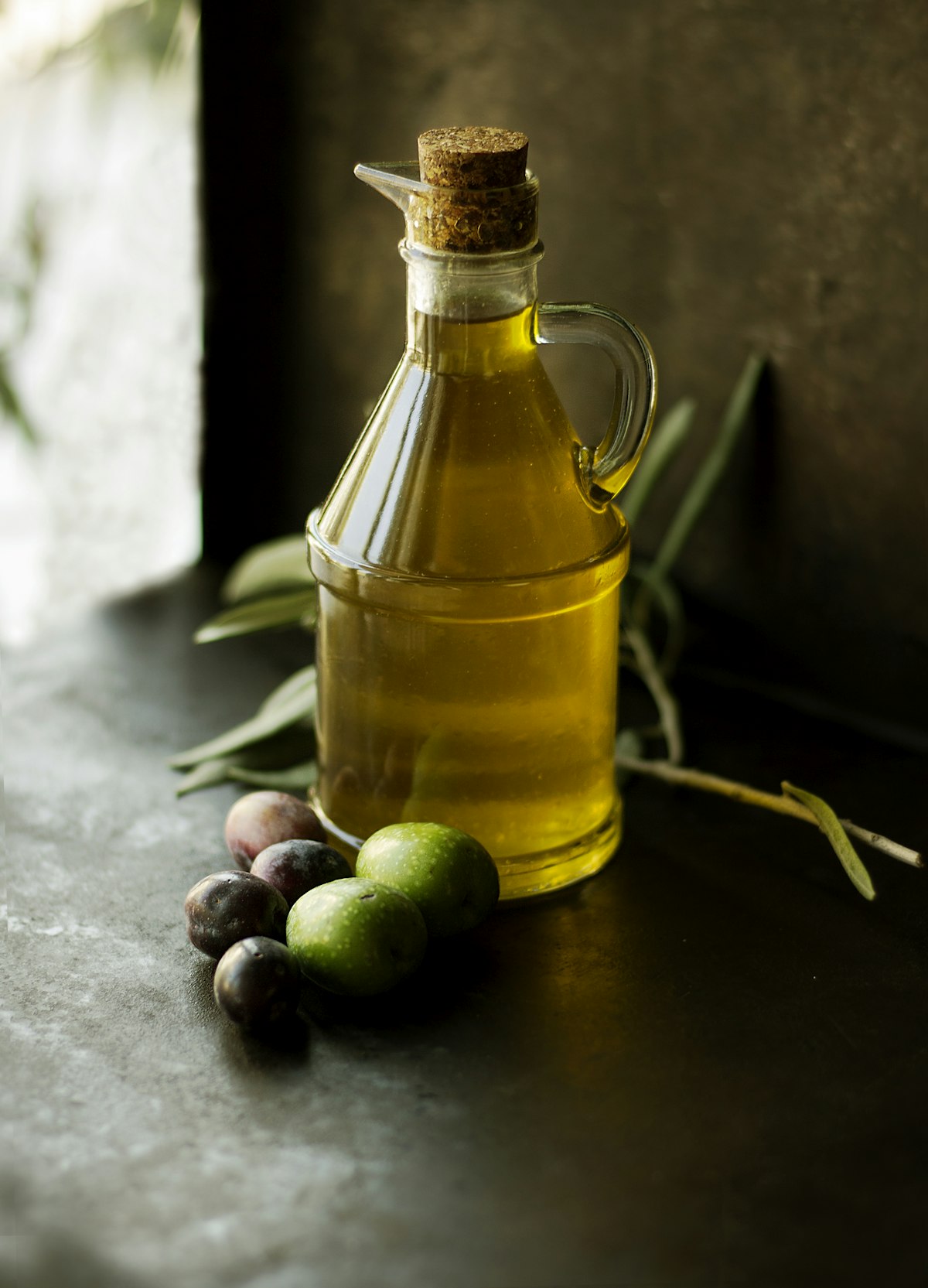 Olive oil and fresh olives